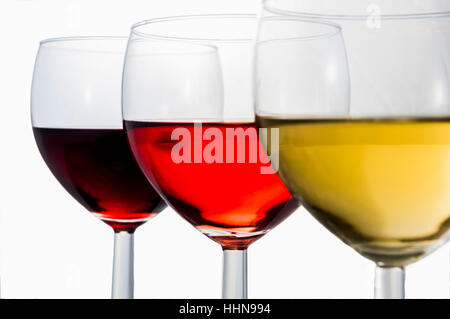3 glasses of red, rose and white wine Stock Photo