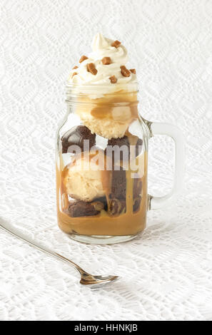 Brownie Ice Cream Sundae in a Mason Jar Stock Photo