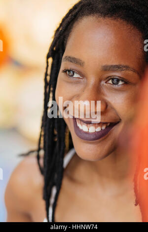 Portrait of smiling Mixed Race woman Stock Photo