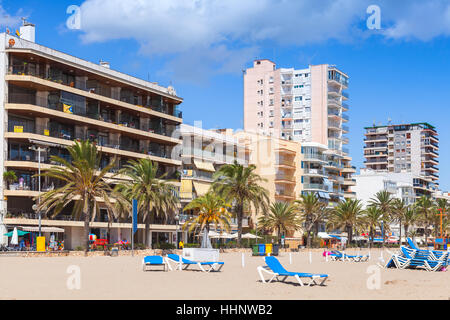 Public beach of Calafell resort town in a sunny summer day. Tarragona region, Catalonia, Spain Stock Photo