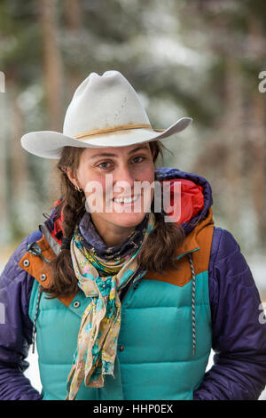 Portrait of smiling Caucasian woman in winter Stock Photo