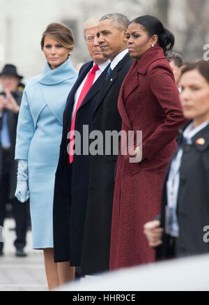 Washington DC, USA. 20th Jan, 2017. President Donald Trump (2nd-L) First Lady Melania Trump (L), former President Barack Obama (2nd-R) and former First Lady Michelle Obama walk together following the inauguration, on Capitol Hill in Washington, DC on January 20, 2017. President-Elect Donald Trump was sworn-in as the 45th President. Credit: MediaPunch Inc/Alamy Live News Stock Photo