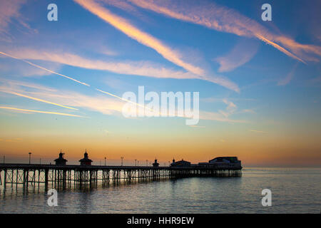 Blackpool, Lancashire, UK. 20th January, 2017. UK Weather. Sunset over the calm hazy Irish Sea and North Pier. Credit; MediaWorldImages/AlamyLiveNews Stock Photo