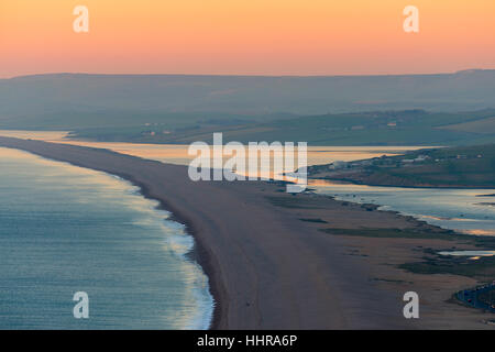 Portland Heights, Portland, Dorset, UK.  20th January 2017.  UK Weather.  The view from Portland Heights on the Isle of Portland in Dorset looking west along Chesil Beach on a cold settled day during the late afternoon at sunset.  Picture Credit: Graham Hunt/Alamy Live News. Stock Photo