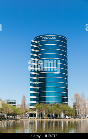 Oracle Corporation headquarters / buildings with a Oracle Team USA yacht racing boat in a pool at Redwood Shores, California Stock Photo