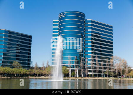 Oracle Corporation headquarters / buildings with a Oracle Team USA yacht racing boat in a pool at Redwood Shores, California Stock Photo