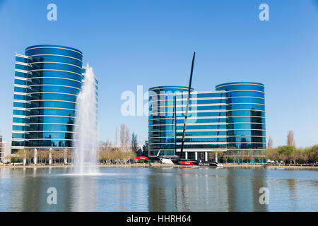 Oracle Corporation headquarters / buildings with a Oracle Team USA yacht racing boat in a pool at Redwood Shores, California Stock Photo