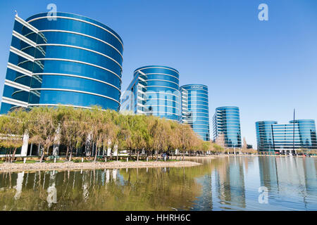 Oracle Corporation headquarters / buildings with a Oracle Team USA yacht racing boat in a pool at Redwood Shores, California Stock Photo