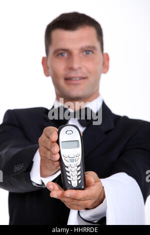 service, male, masculine, butler, hospitality, steward, man, telephone, phone, Stock Photo