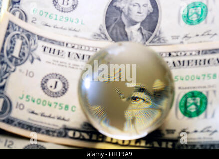 George Washington closeup eye under cristal globe  on the one dollar note Stock Photo