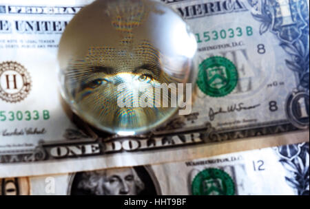 George Washington closeup eye under cristal globe  on the one dollar note Stock Photo