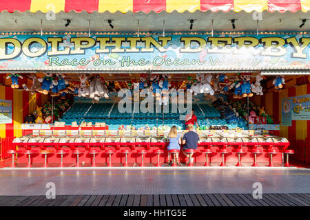 Brighton, UK - September 13, 2016 - Dolphin Derby game at the funfair on Brighton Pier Stock Photo