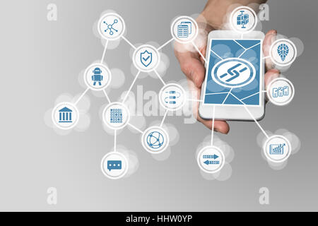 Blockchain concept with hand holding modern smart phone as example for fin-tech technology Stock Photo