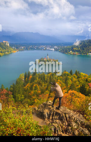 Photographer takes a picture near Bled lake.Slovenia Stock Photo