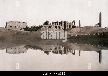 Karnak temple complex. After late 19th century phoograph. Located on the east bank of the Nile River in Thebes (modern  Luxor). Stock Photo