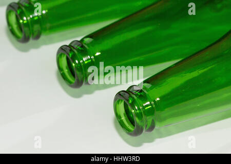 Empty green beer bottles on white background Stock Photo
