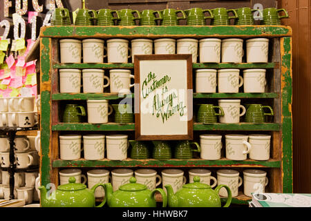 Mugs for sale saying THE CUSTOMER IS ALWAYS WRONG at Fish's Eddy at 889 Broadway in lower Manhattan, New York City Stock Photo