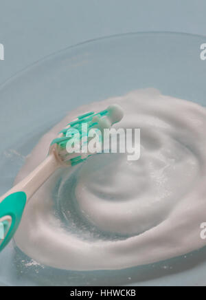 Brightening teeth with sodium bicarbonate Stock Photo