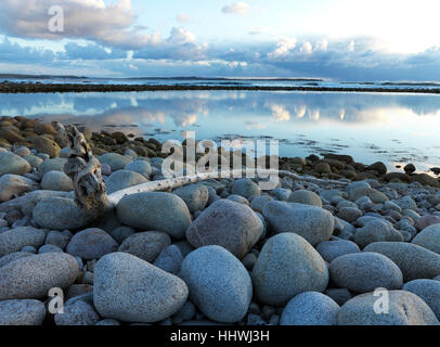 Granite stones, large, round, on coast, cloudy sky, Bloody Foreland, Gweedore, Donegal County, Ireland Stock Photo