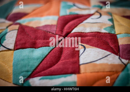 Lovely shot of pillow created by patchwork technique. Pillow from my Grandma. Stock Photo
