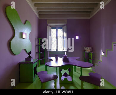 Interior of a home with an unusual decorated dining room kitchen Stock Photo