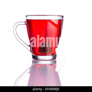 Glass-cup of red fruit tea and bag isolated on white background Stock Photo