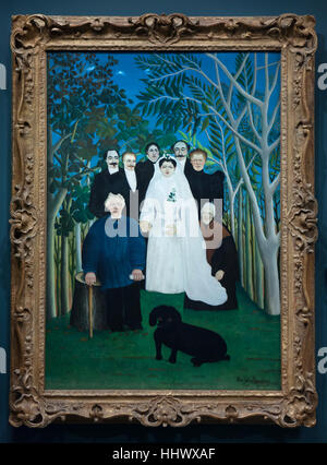 Painting La Noce (Wedding Party, circa 1905) by French post-impressionist painter Henri Rousseau, also known as Le Douanier on display in Musee de l'Orangerie in Paris, France. Stock Photo