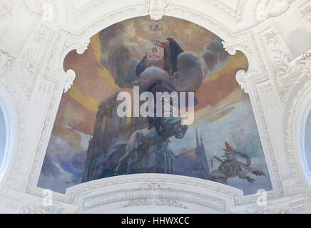 Allegorical ceiling painting Mysticism or Christian Art (1903-1908) by French painter Albert Besnard in the main vestibule of the Petit Palais in Paris, France. Saint George killing the Dragon in front of the Notre-Dame Cathedral and the Coronation of the Virgin Mary are depicted in the mural. Stock Photo