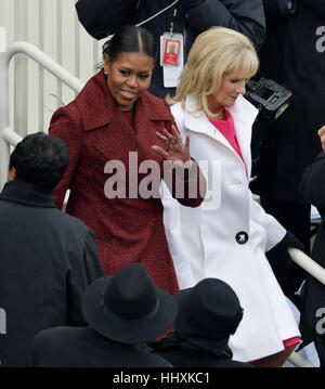 First Lady Michelle Obama, left, arrives with Vice President Joe Biden's wife, Dr. Jill Biden for the 58th Presidential Inauguration for President-elect Donald Trump at the U.S. Capitol in Washington, Friday, Jan. 20, 2017.(AP Photo/Susan Walsh) Stock Photo