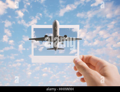 Airplane flying out the instant photo. Toned image. Stock Photo