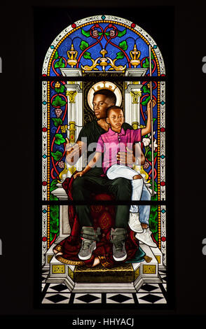 Stained-glass window entitled The Virgin and Child Enthroned (2016) by African-American contemporary painter Kehinde Wiley displayed at his exhibition in the Petit Palais in Paris, France. The exhibition runs till 15 January 2017. Stock Photo