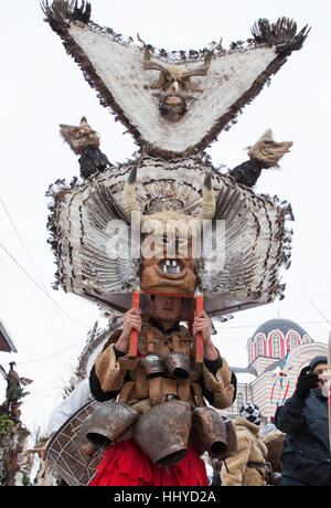 Breznik, Bulgaria - January 21, 2017: Traditional Kukeri costume are seen at the Festival of the Masquerade Games Surova in Breznik, Bulgaria. Surova Stock Photo