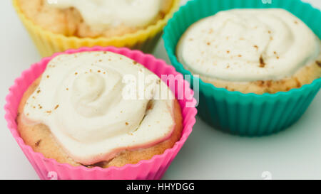 Cupcakes home on a white background closeup. Stock Photo