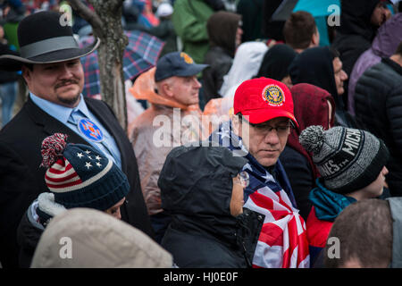 Non-white Donald Trump supporter Native American gentleman all the way from Montana, in large crowd of people awaiting beginning of Inaugural parade along Pennsylvania Ave.  Trump became the 45th President of the United States. January 20, 2017 in Washington, DC Stock Photo