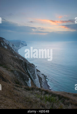 View from White Nothe, Dorset, UK. A bitterly cold sunrise looking east along the Purbeck Jurassic Coastline from high up on White Nothe in Dorset. © Dan Tucker/Alamy Live News Stock Photo