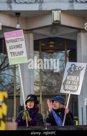 London, UK. 21st January, 2017. Outside the US Embassy - Women's March on London - a grassroots movement of women has organised marches around the world to assert the 'positive values that the politics of fear denies' on the first day of Donald Trump’s Presidency. Their supporters include: Amnesty International, Greenpeace, ActionAid UK, Oxfam GB, The Green Party, Pride London, Unite the Union, NUS, 50:50 Parliament, Stop The War Coalition, CND. Credit: Guy Bell/Alamy Live News