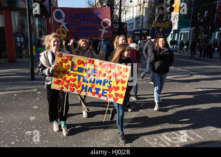 London, UK. 21st January, 2017. Protesters gather in Oxford Street to take part in the Women's March, which is an anti-Trump protest. More than 10,000 protesters walked from Grosvenor Square to a rally in Trafalgar Square. © Vibrant Pictures/Alamy Live News Stock Photo