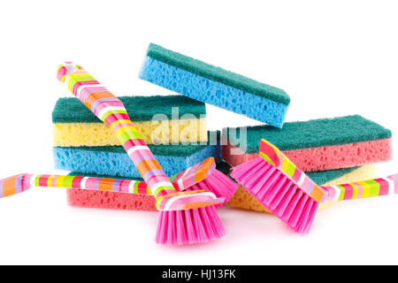 Colorful sponges and brushes isolated on white background. Stock Photo