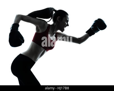 one caucasian woman boxing exercising in silhouette studio  isolated on white background Stock Photo