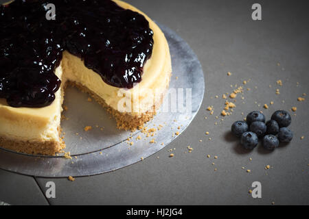 piece of freshness delicious blueberry cheese cake on plate is sweet baked bakery dessert,selective focus. Stock Photo