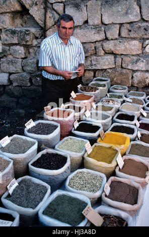 Herbs and Spices for Sale on Market Stall, or Vendor Selling Herbs, Spices, Dried Beans and Pulses, and Shopkeeper Antalya Turkey Stock Photo