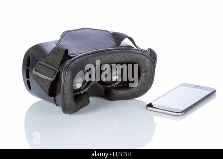 VR Glasses and smartphone with clipping path for screen isolated on white background. Stock Photo