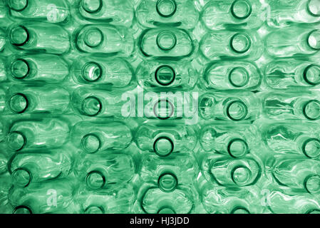 Large group of empty green color recycled glass bottles Stock Photo