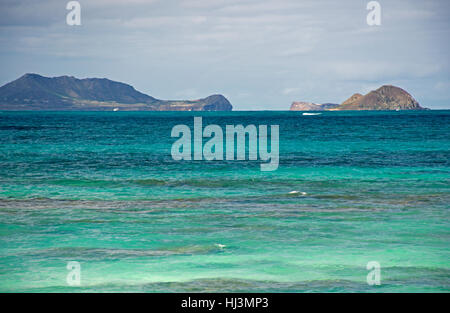 Mokulua islands viewed from Waimanalo Beach, Windward Oahu, Hawaii, USA Stock Photo