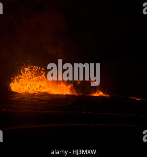 Active lava exploding inside the Halemaumau Crater at night, Kilauea Volcano, Volcanoes National Park, Hawaii, USA Stock Photo