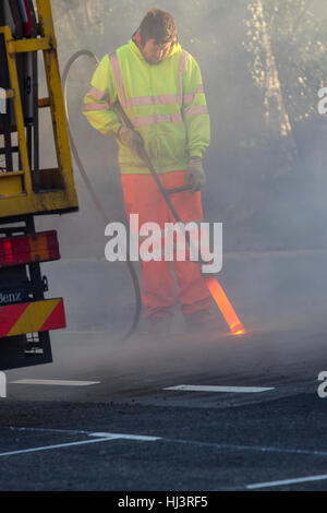Thermal lance line removal burns off line markings at extremely high