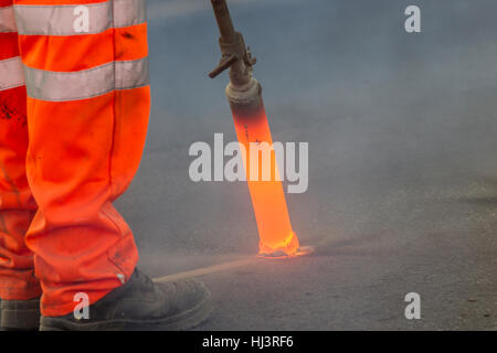 Thermal lance line removal burns off line markings at extremely high