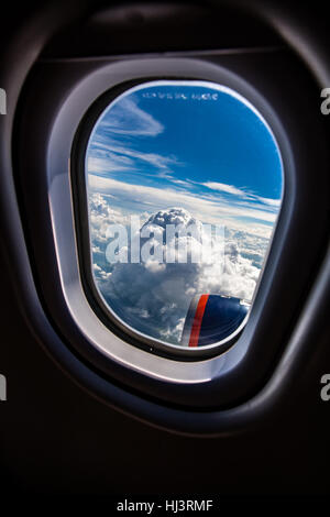 Classic image through aircraft window onto jet engine Stock Photo