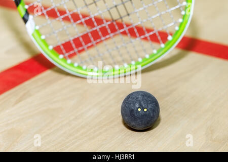 squash racket and ball Stock Photo
