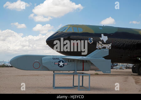 MC Donnell ADM - 20C Quail decoy missile in front of  Boeing B-52D Stratofortress Bomber on display at Pima Air & Space Museum Stock Photo